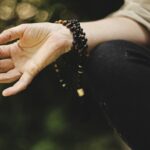 person doing meditation outdoors